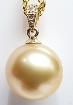 11mm GOLD S/SEA 9KYG MILL BAIL,0.01ct