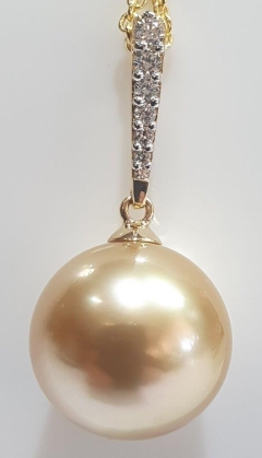 15mmGOLD S/SEA.,18KYG TAPRD PND 0.19ct