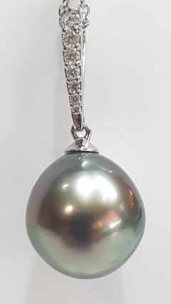 15mmTAH.,18KWG TAPRD PND 0.19ct